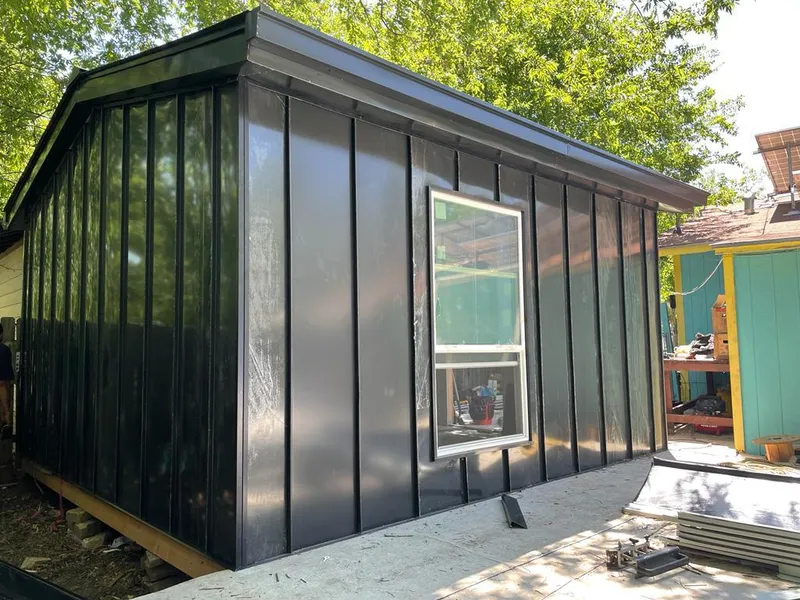 Black standing seam metal wall panels for Roof Inspection in Balch Springs